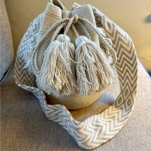 Wayuu Tribe Cream Handwoven Bucket Bag with Tassels and Patterned Strap